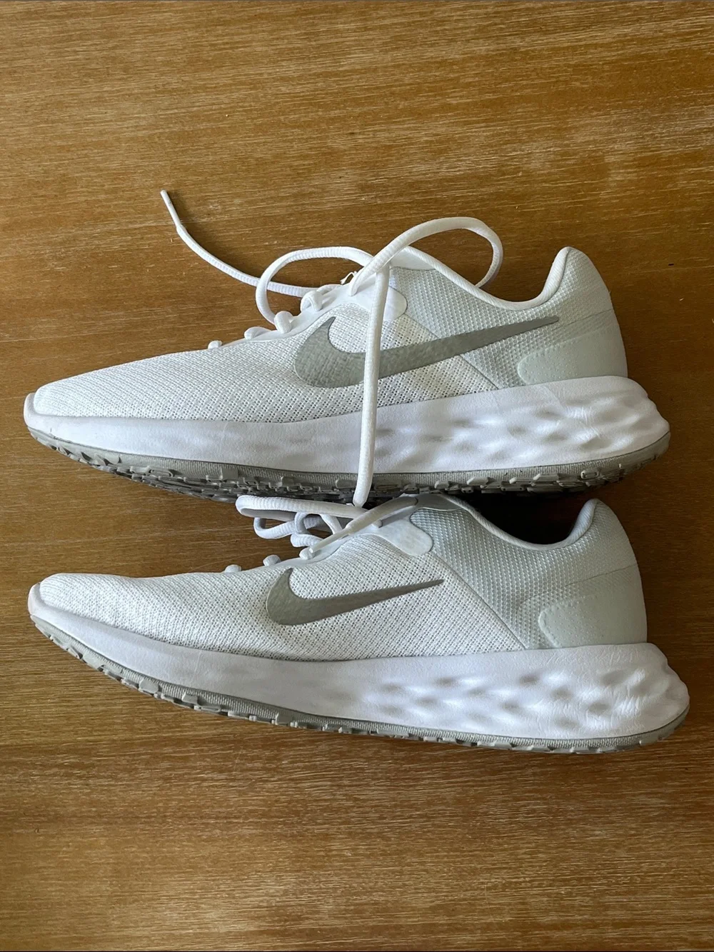 Nike Women’s White Sneakers with Silver Swoosh